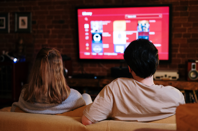 Couple on the couch watching TV